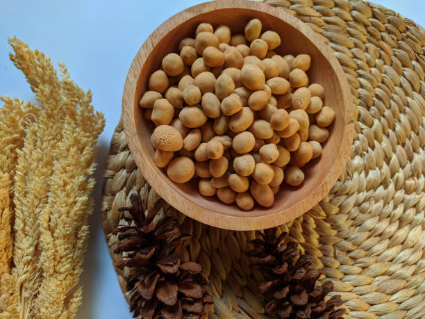 istock Indonesian snacks commonly called egg nuts are in a wooden bowl. top view 1484742509