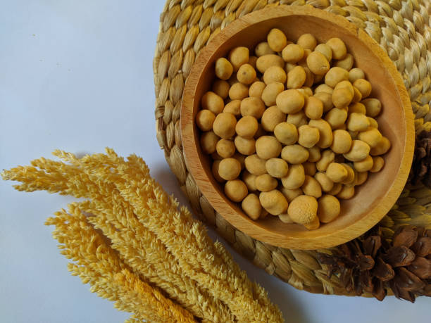 istock Indonesian snacks commonly called egg nuts are in a wooden bowl. top view 1484742518