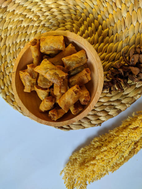 istock crunchy snacks are in a wooden bowl. top view 1484742585
