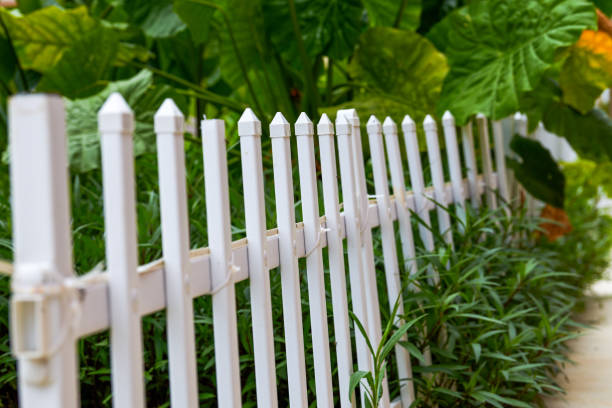 istock White plastic guardrail used for outdoor partition in park 1484742759