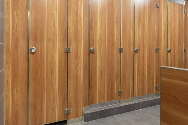 istock Empty public restroom with wooden partition 1484744812