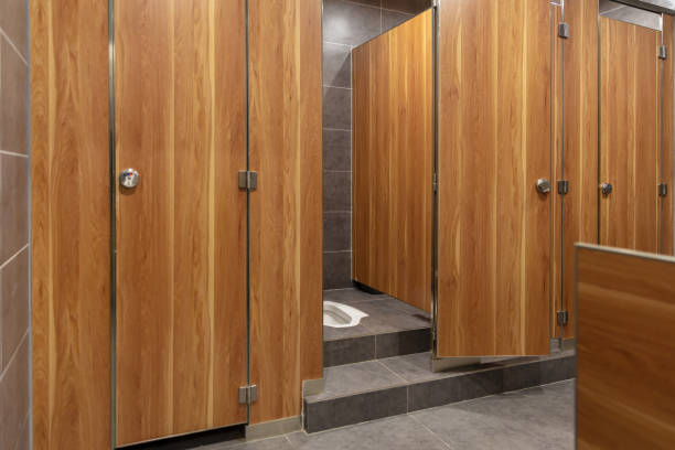 istock Empty public restroom with wooden partition 1484744843