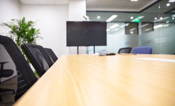 istock Modern office interior, empty conference room with green plants and tables and chairs 1484748073