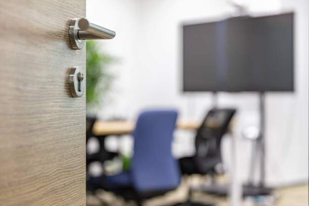 istock Modern office interior, empty conference room with green plants and tables and chairs 1484748116