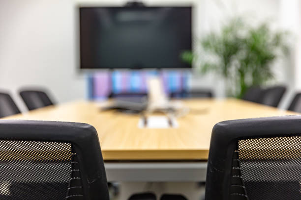 istock Modern office interior, empty conference room with green plants and tables and chairs 1484748125