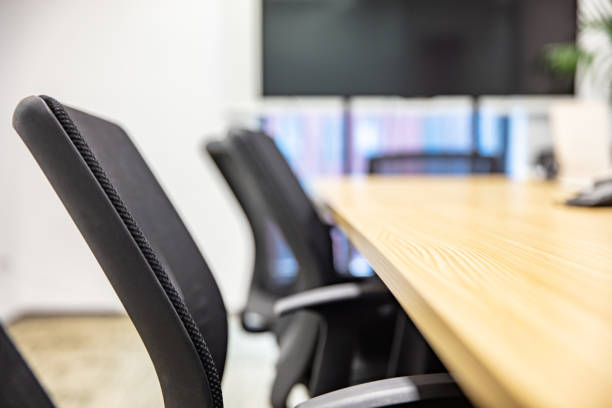istock Closeup of chairs in modern conference room interior 1484748170