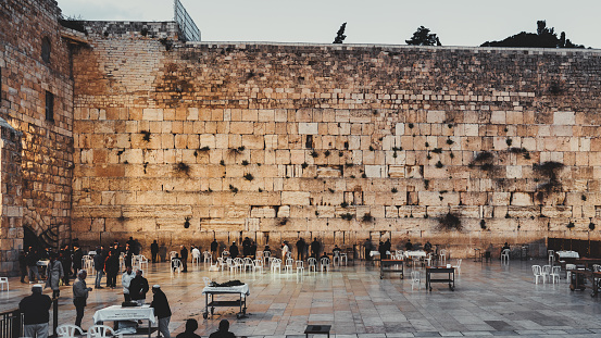 Panorama of Jerusalem Western Wall - Wailing Wall or short 'the Kotel' in Jerusalem. Crowd of Jews praying at the Western Wall - Wailing Wall - Klagemauer during the Passover Celebration Days. Wailing Wall - Western Wall, Jerusalem Old City, Israel, Middle East.