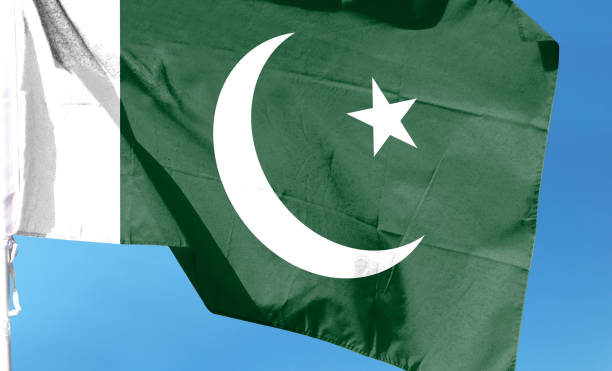 istock Pakistan flag in cloudy sky. waving in the sky 1484750062