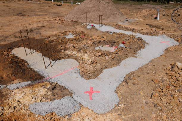 istock Housing Construction. Concrete Footings With Steel Reinforcement Bars. 1484750295