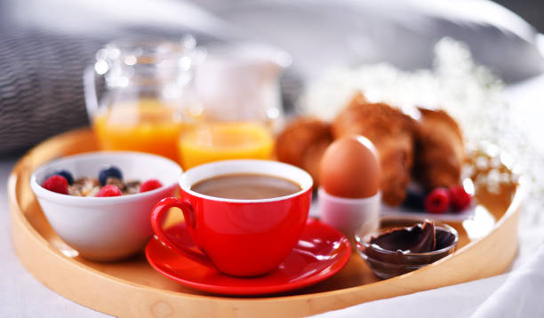 istock A tray with breakfast on a bed in a hotel room 1484752939