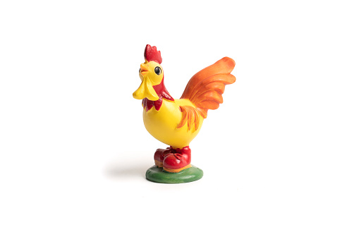 Toy chicken isolated on a white background. High quality photo