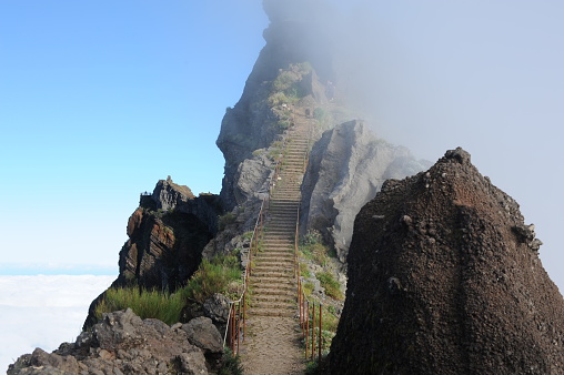 Third highest mountain peak Pico do Areeiro with stone steps or stairs perfect for hiking on Madeira island, Portugal, Europe