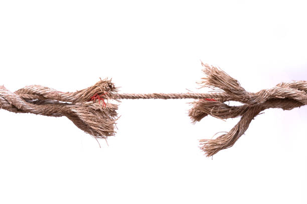 istock The hemp rope is about to break. is about breaking concepts for, vulnerable issues, Business is in decline. Lack of financial liquidity, business on the verge of bankruptcy 1484756780