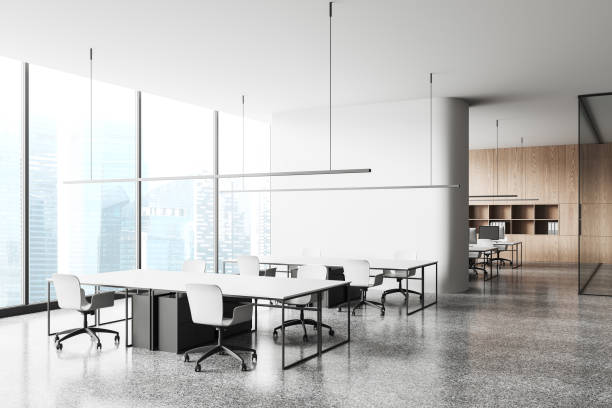 istock Modern office room interior with chairs and table, coworking zone and window 1484756950