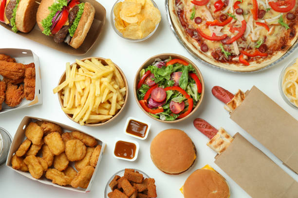 istock Concept of fast food on white background 1484757083