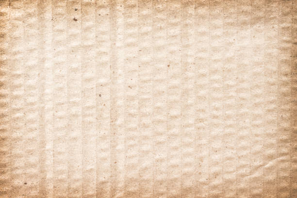 istock Corrugated paper grunge texture with wrinkle patterns light brown old background 1484757138