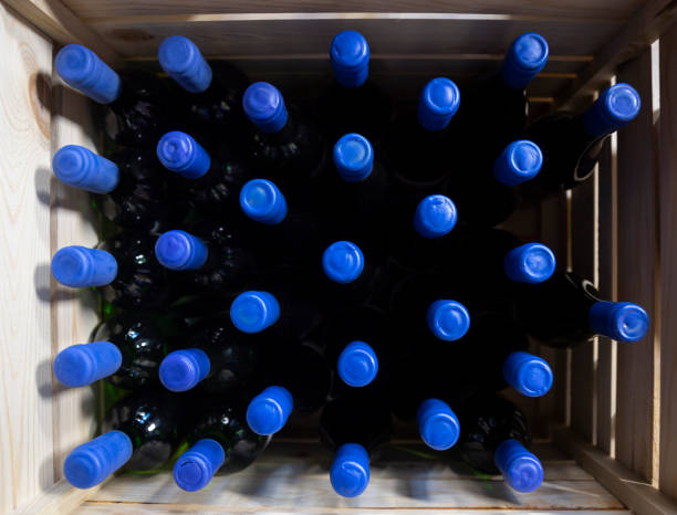 istock Bottles of wine in a winery 1484757322
