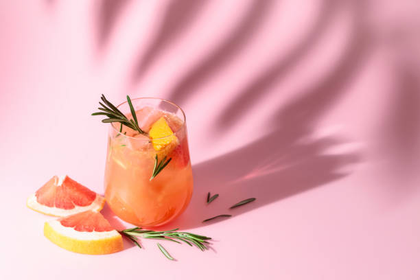 istock Summer cocktail with grapefruit, rosemary, and ice. 1484758890