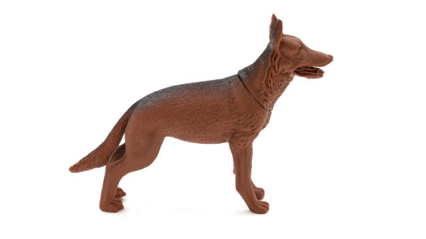 istock German Shepherd. Plastic dog toy isolated on white background. 1484758971