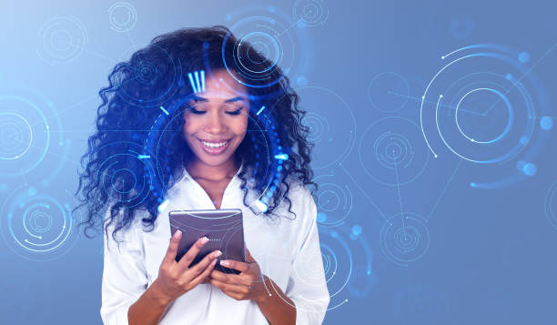 istock Cheerful young African woman with tablet, network interface 1484760153