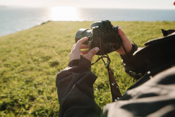 istock Detail of a woman using a DSLR camera 1484760987