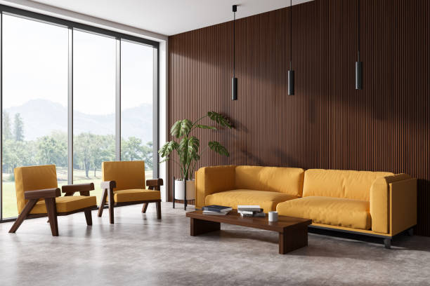 istock Corner view on bright living room interior with armchairs, sofa 1484762646