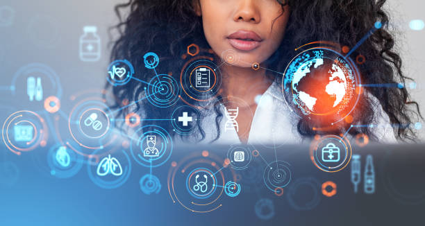 istock African American woman with laptop, medical interface 1484763474
