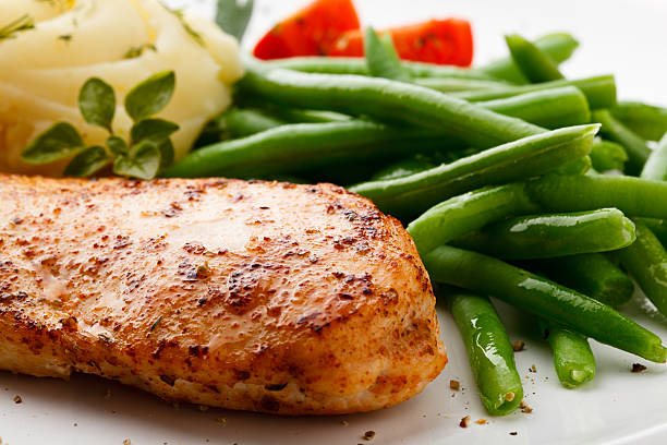 istock Grilled chicken fillet and vegetables 148476354