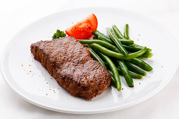 istock Grilled meat and green beans 148476459