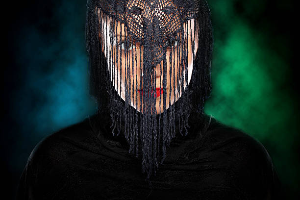 A picture of a young muslim girl over dark background