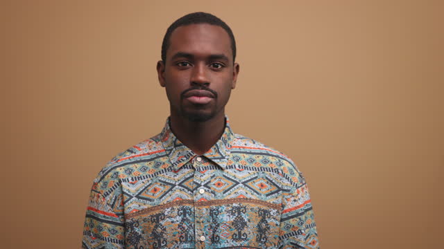 Portrait of confident male wearing printed shirt