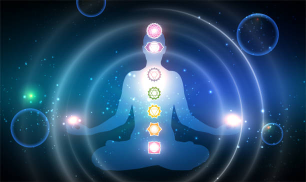 istock Silhouette of Human sitting in yoga lotus position on meditative space 1484769333