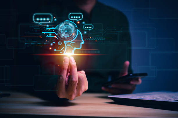 istock Businessman holding hologram digital chatbot,  conversational assistant, AI Artificial Intelligence concept, chat bot application, digital chatbot on virtual screen. 1484769548