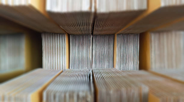 istock Selective focus, perspective view close up stack of corrugated cardboard box folded, pleated paper, texture, objects, logistics, business concept for background or wallpaper 1484770846