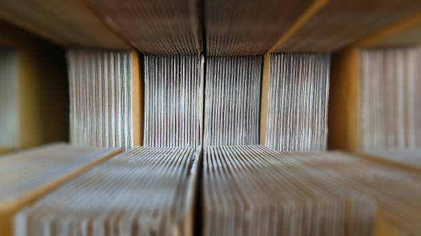 istock Selective focus, perspective view close up stack of corrugated cardboard box folded, pleated paper, texture, objects, logistics, business concept for background or wallpaper 1484770859