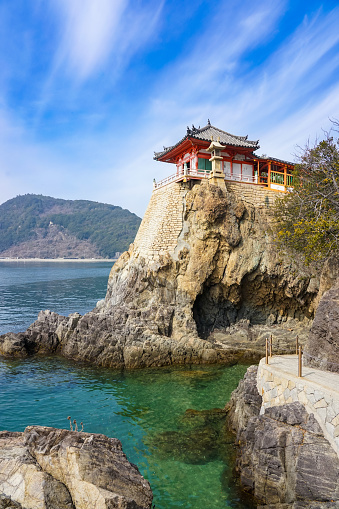 Abuto Kannon enshrined on the cliff of Cape Abuto at the tip of the Numakuma Peninsula in Fukuyama City, Hiroshima Prefecture on a sunny day in March 2023.