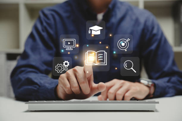 istock Young man pointing to education icon. 1484777916