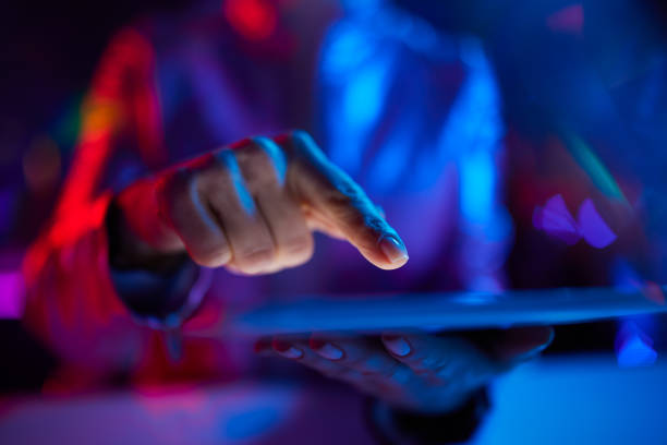 istock Closeup on woman with tablet PC 1484779003