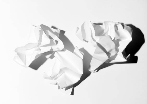 istock three crumpled sheets of white paper against white background with deep shadows 1484779783