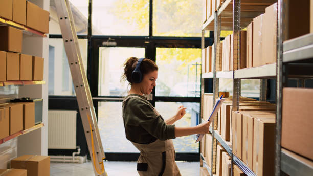 istock Woman dancing holding inventory list 1484781826