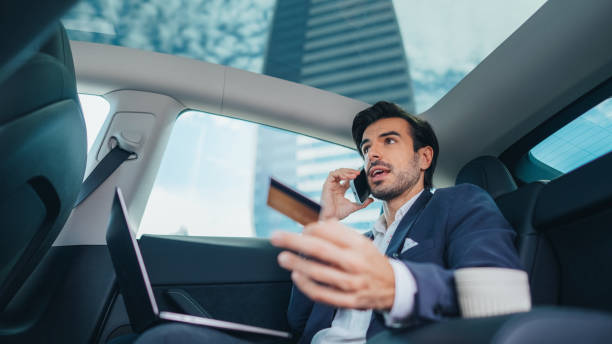istock Businessman is calling the bank about credit card support 1484783996