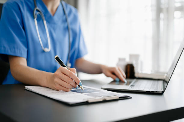 istock Medical technology concept. Doctor working with mobile phone and stethoscope in modern office 1484786215
