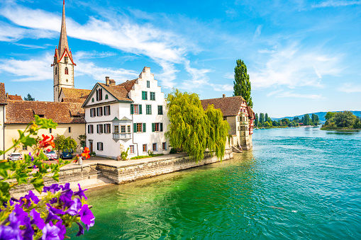Rhine river in Stein am Rhein, Switzerland during a beautiful summer day. A ferry service sails over the river Rhine and the Untersse between Schaffhausen and Constance on the shore of the Bodensee