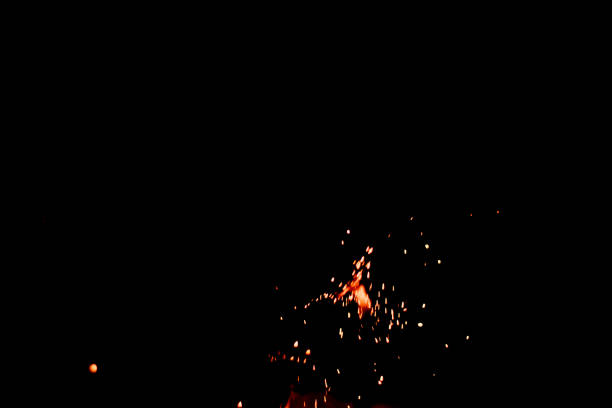 istock A bunch of flying sparks on black background; for overlay usage 1484787277