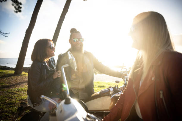 istock Friends outdoors with motorbike 1484787586