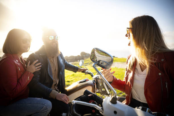 istock Friends outdoors with motorbike 1484788304