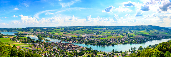 Rhine river in Stein am Rhein, Switzerland during a beautiful summer day seen from above from the Hohenklingen Castle. A ferry service sails over the river Rhine and the Untersse between Schaffhausen and Constance on the shore of the Bodensee