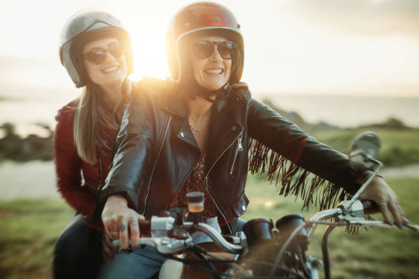 istock Women outdoors with motorbike 1484790189