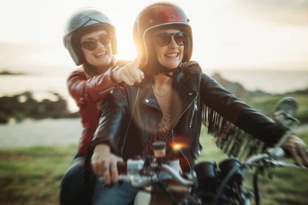 istock Women outdoors with motorbike 1484790191