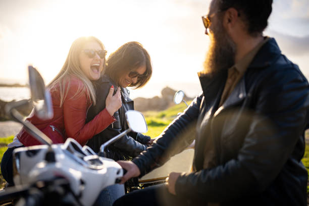 istock Friends outdoors with motorbike have fun 1484790632